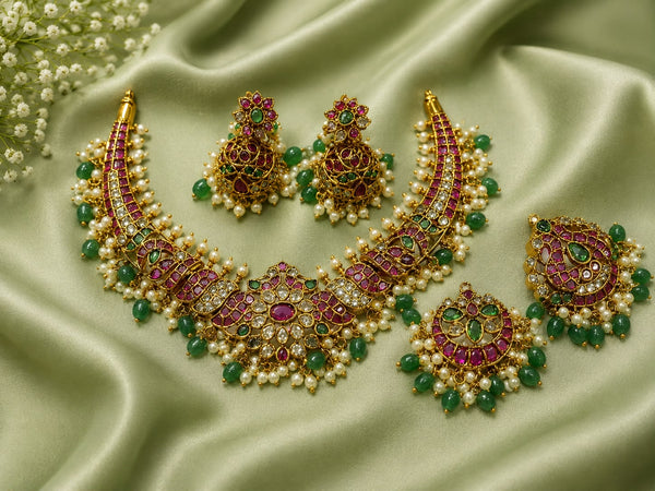 Premium Gold Plated Temple Jewellery Set for Women | Ruby Green Stone Bridal Necklace Set with Jhumka Earrings, Maang Tikka & Finger Ring